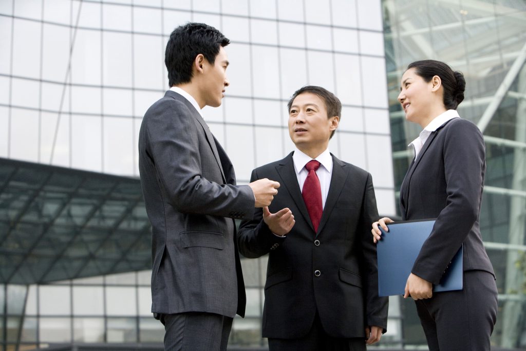 Entrepreneurs from China discussing business in Malaysia